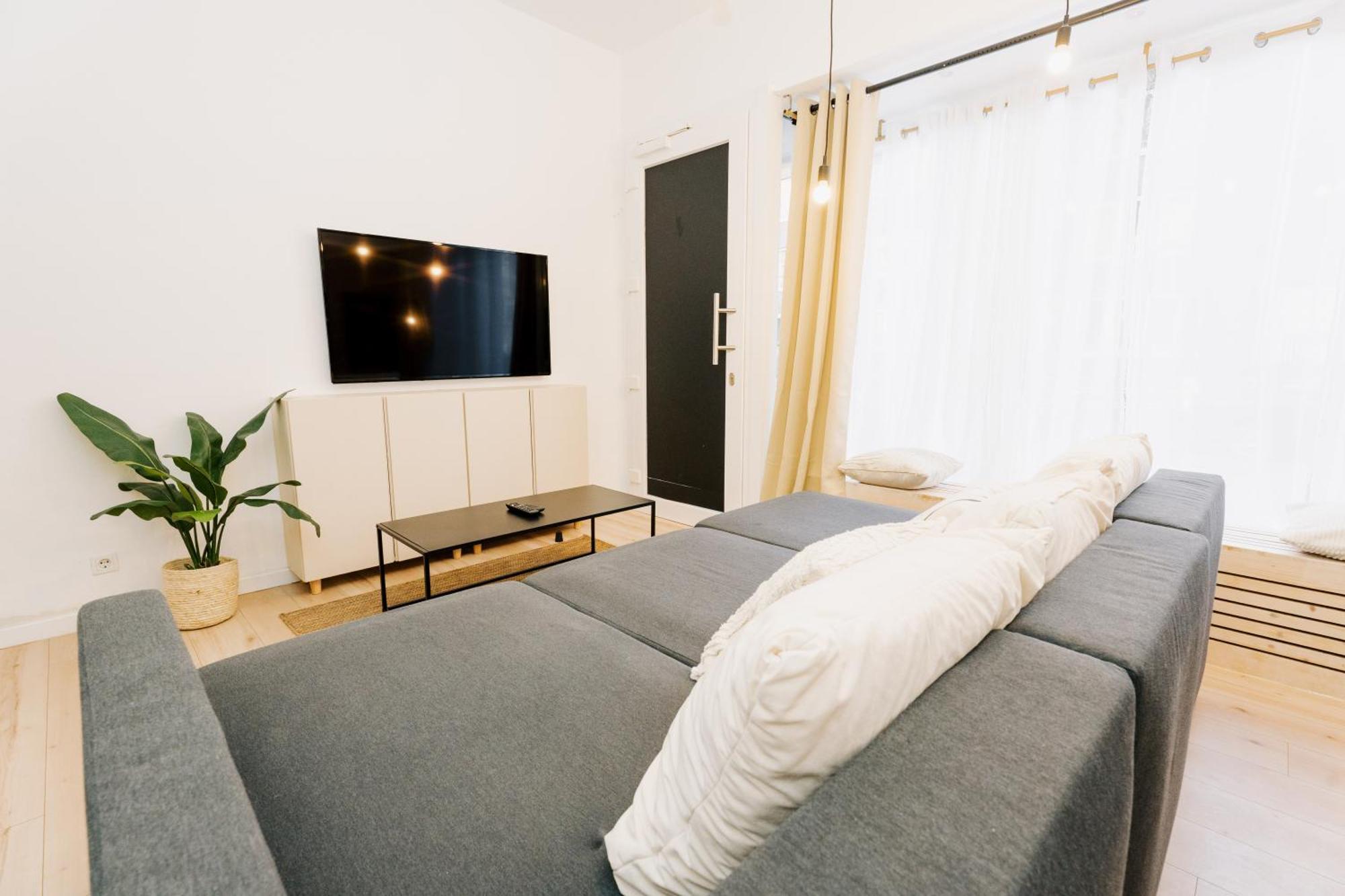 City-apartment „kreuzviertel-lädchen“mit Parkplatz